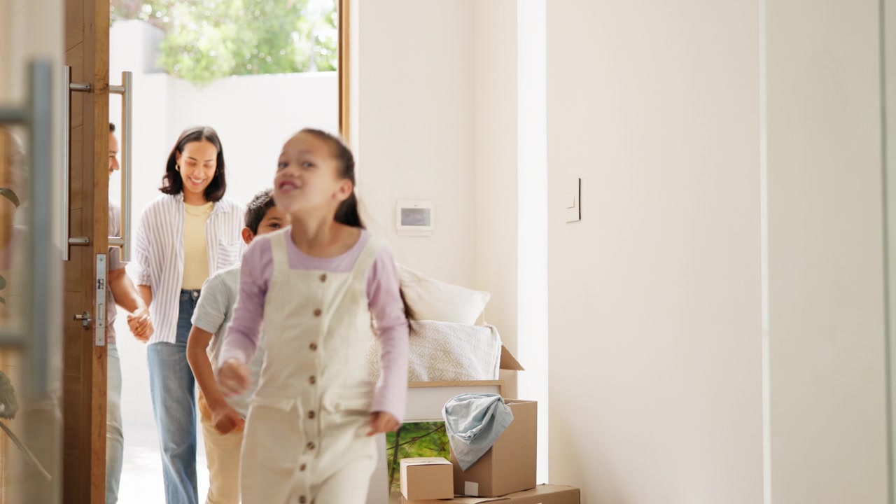 Family with two children moving into their new home
