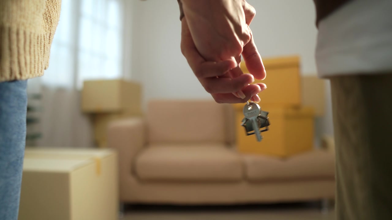Homeowner receiving the keys to their next home