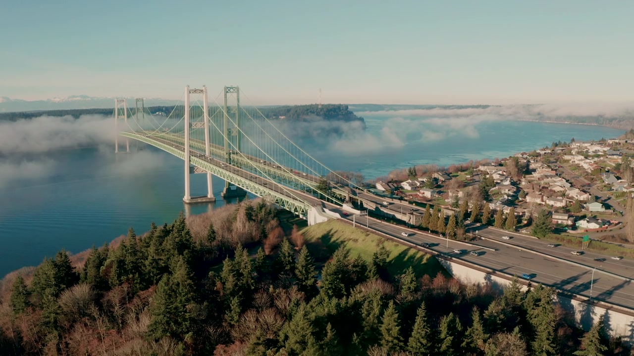 Fog rolling under the Tacoma Narrows Bridge