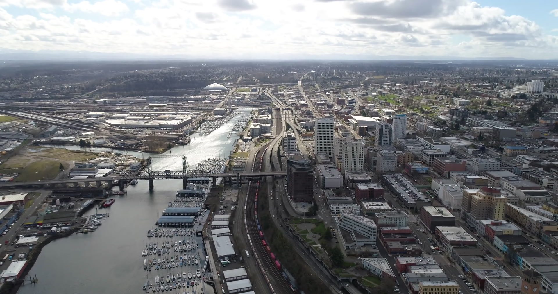 Aerial view of downtown Tacoma, the Thea Foss Waterway, and Commencement Bay