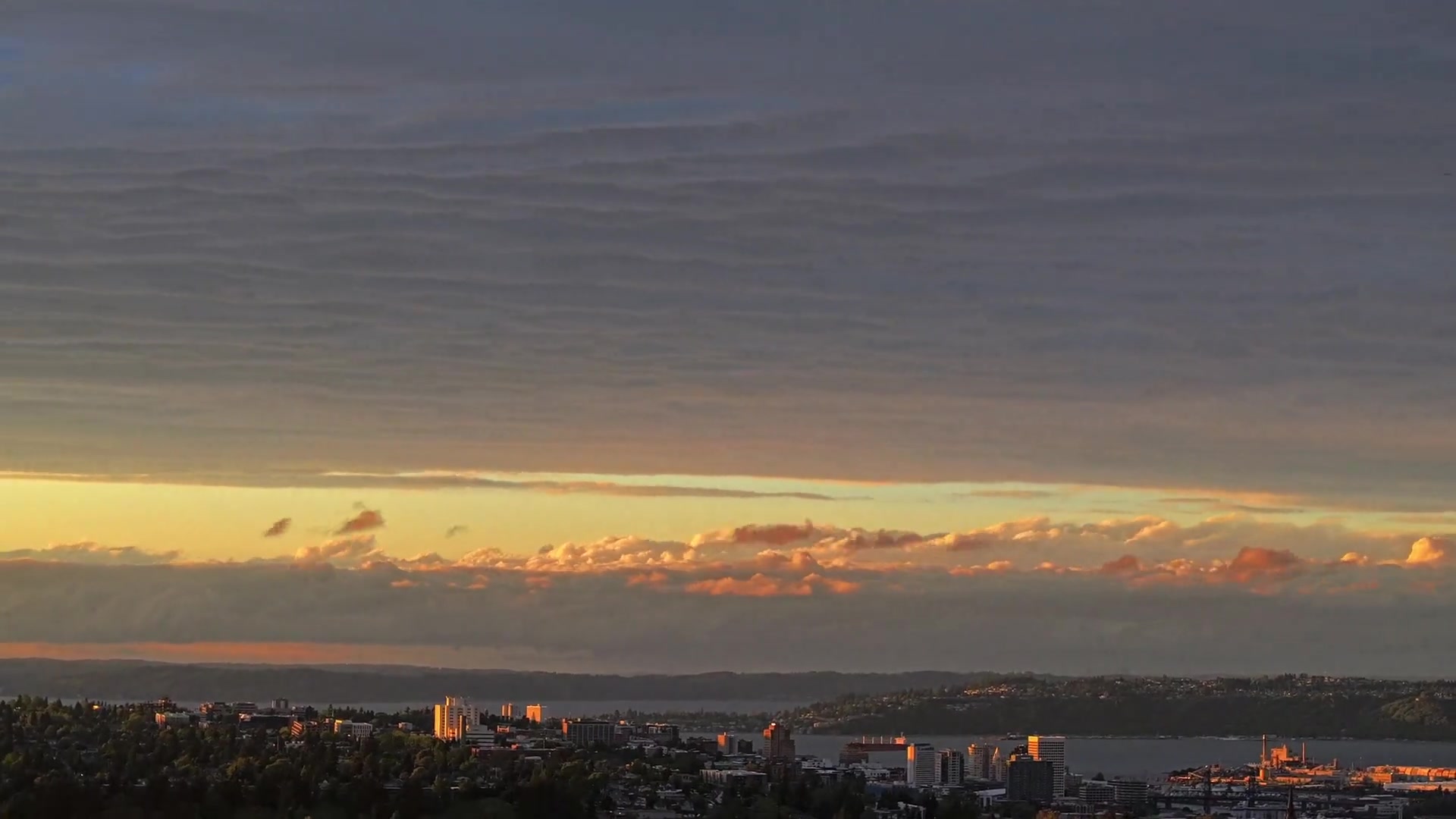 Sunset clouds over the Tacoma skyline