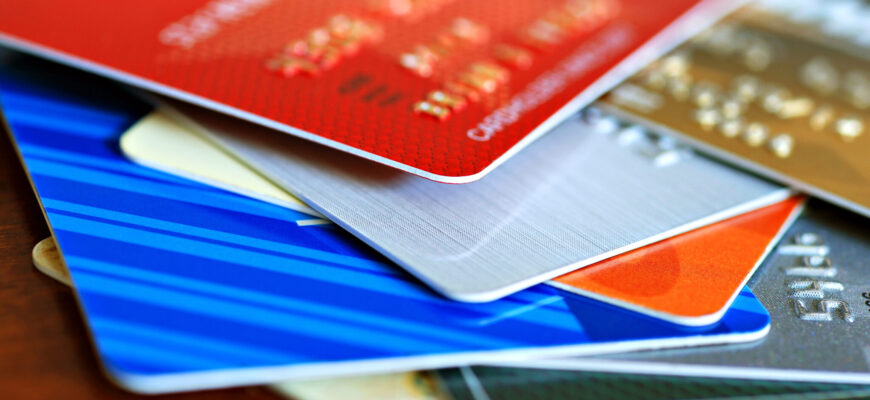 a close up of a colorful stack of credit cards