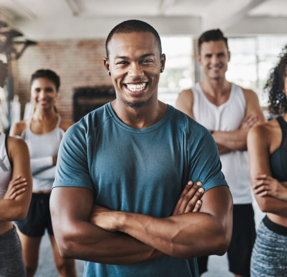 a group of people smiling after discovering our free checking account.