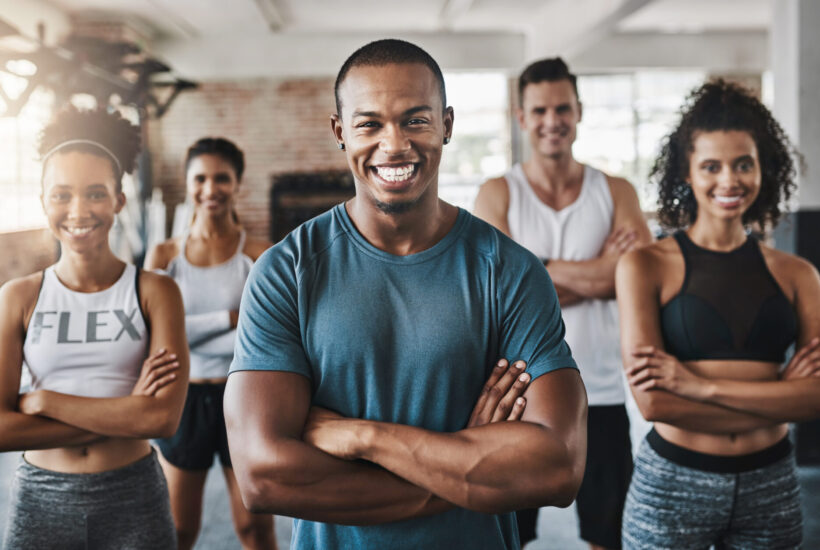 a group of people smiling after discovering our free checking account.