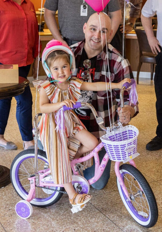 A Heart-Warming Gift - ACU Presents Bicycle to Egg Hunt Raffle Winner