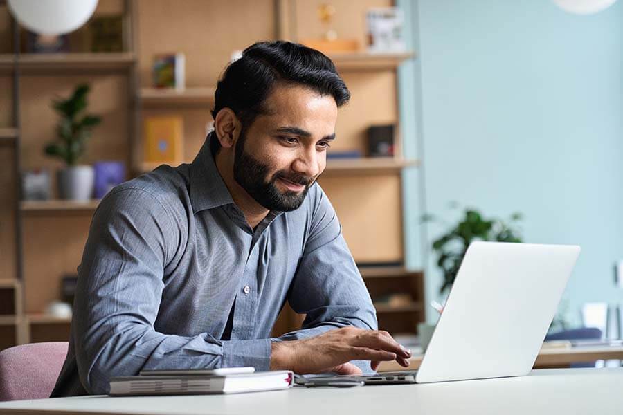 Man using his computer to make an online payment